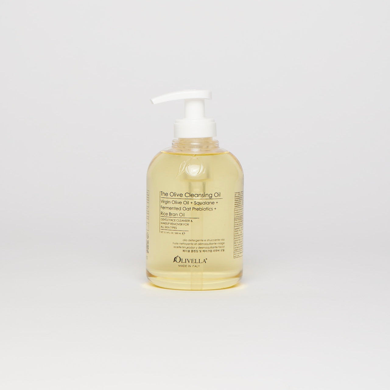 Bottle of olive cleansing oil on a white background